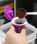 Disposable K Cup Coffee Filters 200 Count For Keurig 1.0 And 2.0 Brews Single Serve Paper Filters being filled with coffee