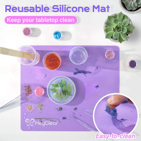 Reusable silicone mat from Epoxy Resin Kit With Molds For Newbies 18 Oz, including molds, glitter, and measuring cups.