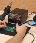 Hands using 2-In-1 Hot Air Soldering Station Kit With 60W Soldering Iron, 3 Pro-Grade Preset Temperature Channels for PCB rework