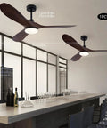 Pwefhsdjvh Ceiling Fan with Remote Control 48W LED Light 6 Speeds Quiet installed in a modern bar setting.