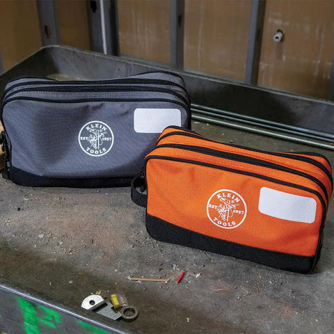 Dual Compartment Tool Pouch Heavy Duty Tool Bag Organizer with gray and orange pouches on a workbench