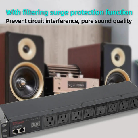 Badass 1U Rack Mount Power Conditioner With Eight Individually Switched Outlets Heavy Duty Surge Protection Led Voltage Display Smart Sequencing For Pro Audio And Data Racks in a studio setting with speakers.