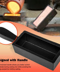 Front view of black cast-iron rectangular loaf ingot mold with handle for melting and casting metals