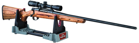 Compact Range Vise With Folding Forks And NonMarring Cradle For Easy Transport And Safe Firearm Cleaning holding rifle