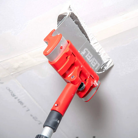 Extendable Drywall Skimming Blade Handle 38.5-63 Inches Pro Grade Anodized Aluminum in use on drywall ceiling joint