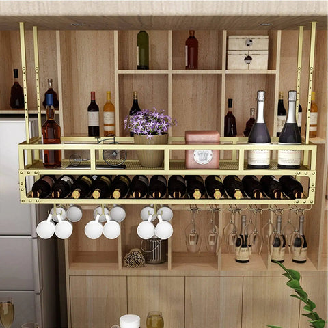 Hanging Wine Glass Rack Ceiling Mount With Adjustable Telescoping Arm holding bottles, glasses, and a plant in kitchen storage