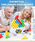 Group of people playing the 48 Piece Stack Up Tower Game For Adults And Kids Chill Family Game Night with colorful blocks.