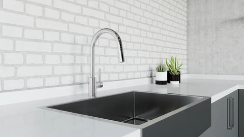 Stellen Bar Faucet With Pull Down Sprayer High Arc And Single Handle Polished Chrome Finish installed over a sink