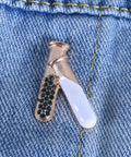 4 Piece Chemistry Beaker Brooch Set With Flask Design, Metal Alloy Scientist Lapel Pins on denim backdrop