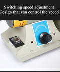 Control panel of Pro Grade Jewelry Polisher Buffer Bench Lathe Set With Jade Grinder And Flexible Shaft Mini Table Saw Polishing Tool 26000 Rpm Adjustable Speed For Metals Stone Glass Beads Beeswax And Plastic showing speed adjustment knob and switch