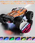 Beast Of An All Terrain Off Road RC Car With 4WD shown with cool lights, 1:20 scale orange design, perfect gift for Christmas.
