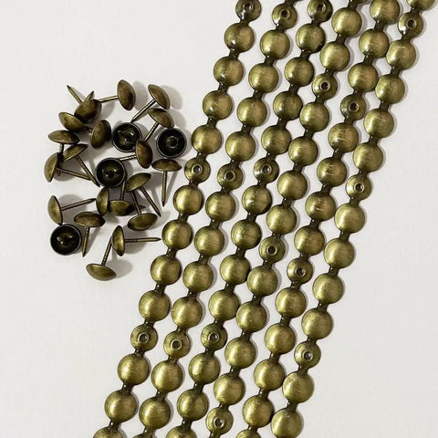 Top Shelf Heavy Duty Brass Upholstery Tack Strips With 11mm Decorative Nail Heads 5 Meters Total Includes 85 Matching Fasteners visible in image.