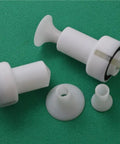 Heavy Duty Electrostatic Powder Coating Spray Gun Featuring Hella Durable Construction and No Sweat Operation parts on green surface.