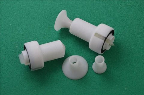 Heavy Duty Electrostatic Powder Coating Spray Gun Featuring Hella Durable Construction and No Sweat Operation parts on green surface.