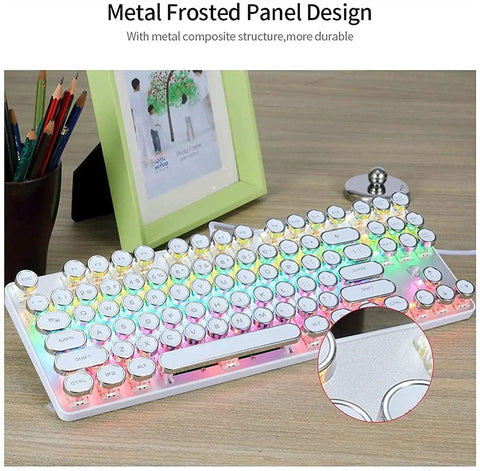 Killer Mechanical Gaming Keyboard With 107 Keys Wired Blue Switches Hella Smooth Typing And Dope Dynamic Backlight Tough Metal Frame Built For PC And Mac Players To Dominate Every Match. Close-up of the metal frosted panel design and colorful backlighting.