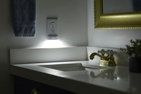 Two Pack MotionLight Built In Wall Plate LED Night Lights For Duplex Outlets With Auto On Off Sensor illuminating bathroom sink