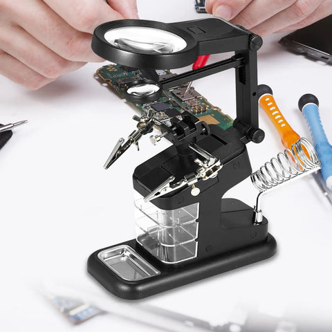 LED Magnifying Lamp With USB Power For Soldering And Electronics Repair, features adjustable gooseneck and clamp on a workbench.