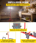 Two Pack 10000 Lumen Dual Head LED Work Light On Adjustable Foldable Tripod Stand illuminating a workshop space.