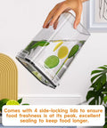 Clear airtight container with lime and lemon slices demonstrating sealed freshness, part of the Airtight Food Storage Containers With Lids 24 Pack.