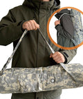 Man holding camo bag for 6.8L PCP Air Tank System For Paintball And HPA Scuba Gear, Carbon Fiber Tank With M18x1.5 Threads