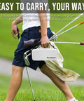 All In One Golf Glove Holder Case With Glove Shaper Portable Organizer for Balls Tees Markers and Gear being carried on a golf course.