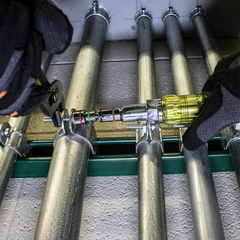 Using Magnetic 7 In 1 Nut Driver With Cushy Grip One Hand Drive on pipes; visible seven sizes, strong magnets holding bolts.