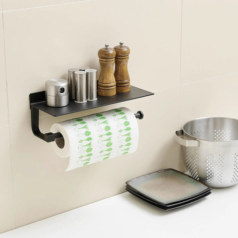 Black Wall Mount Towel Holder With Shelf For Bathroom And Kitchen holding paper towel and spice jars over countertop