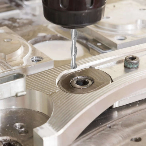 Ball nose end mill cutting a curved aluminum workpiece; 1/8 inch shank, 2-flute solid carbide router bit