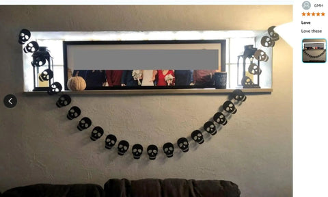 Bold Black Skull Garland Decorations For Halloween And Gothic Parties Edgy Horror Banner Decor Perfect For Haunted Houses Pirate Themed Nights Rock And Metal Venues Dark Aesthetic Events hanging across a wall