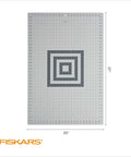 Fiskars self-healing cutting mat for quilting, gray 24x36 in, grid with center spiral design, Fiskars logo