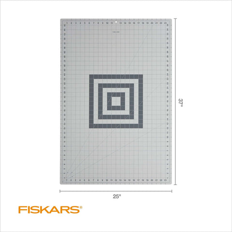 Fiskars self-healing cutting mat for quilting, gray 24x36 in, grid with center spiral design, Fiskars logo