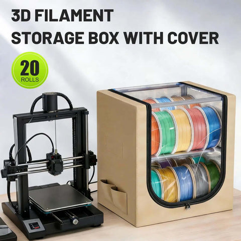 3D printer beside 2 Tier Metal Filament Dry Storage Box With Leather Cloth Cover Holds Up To 20 Spools for organized filament storage.