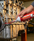Applying Industrial RTV Silicone Gasket Maker Sealant With Auto Dispensing Nozzle to engine, red form in place gasket visible