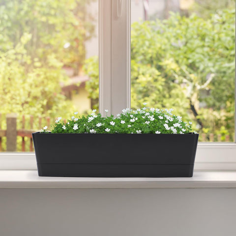 3 Pack 16x3.8 Inch Window Box Planters With Drainage Holes And Trays, Black Rectangular Plastic Pots displayed on windowsill