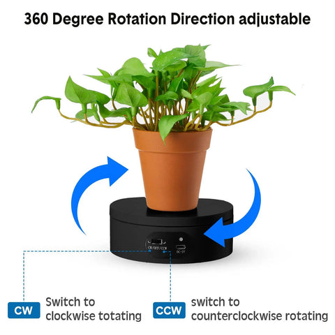 6 Piece Black Turner Cup Rotating Display Stand With USB Power Cable And Silent Motor Battery Backup For Kitchen Tumbler Organization displaying plant.