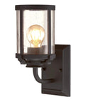 Colville Three-Light Indoor Vanity Wall Fixture In Oil Rubbed Bronze With Clear Seeded Glass, front view, bulb illuminated