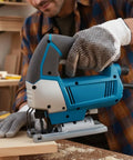 Person using a jigsaw with Rock Solid T Shank Jigsaw Blades Beefy High Carbon Steel Jig Saw Replacements for cutting wood.