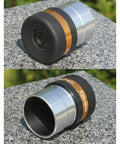10mm Telescope Eyepiece 1.25 Inch Ultra Wide 62 Degree Field Of View Aspheric Lens with fully multi coated optics on stone surface