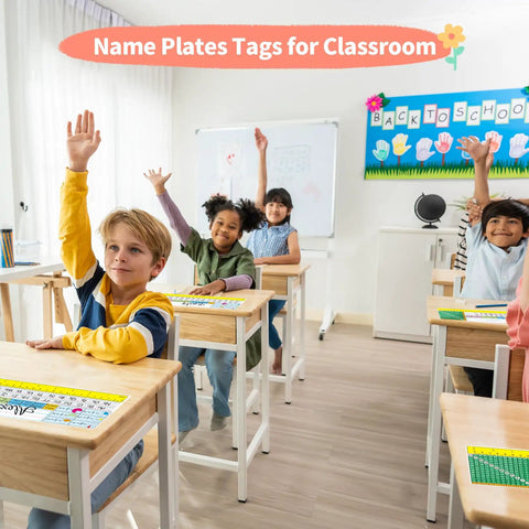 Children in classroom with 40 Piece Waterproof Desk Nameplates For Classroom Use Kid Friendly Multipurpose Name Tags on desks
