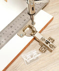 Beefy Frosted Acrylic Cabinet Door Hinge With Pre Drilled Holes Wear Resistant installed with ruler and screwdriver