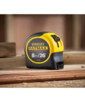 Fatmax Tape Measure With Blade Armor And Dual Scale 8m Length on wooden surface in workshop