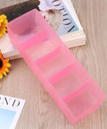 Solid Plastic Underwear Organizer Box With Five Grid Dividers For Closet Drawer Storage, pink design on wooden surface.
