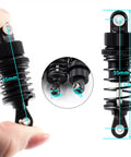 Close-up of 55mm Front And Rear Oil Filled Shock Absorber Damper Suspension Set for Tamiya TT02 1/10 RC car, black aluminum