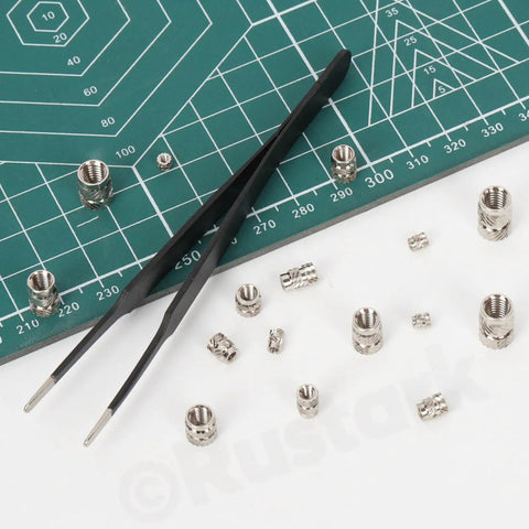 101 Piece M2 To M6 Heat Set Threaded Inserts Kit With Tweezers For Plastic And 3D Printing, 303 stainless steel, on cutting mat