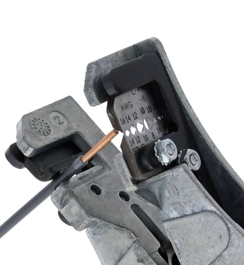 Close-up of Stripmaster Wire Stripper For 10-22 AWG showing precision stripping mechanism with heavy duty die cast zinc frame.