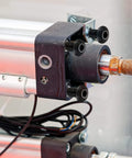 Close-up of machinery with hex socket button head cap screws, highlight on 115 Piece M8 Screws And Nuts Assortment Kit in use for mechanical setup.