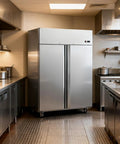 Pro Grade Commercial Reach In Freezer, Stainless Steel Upright Industrial Cooler For Restaurants And Bars in kitchen setting.