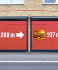 Solar Powered Outdoor LED Wall Light 10W For Billboards And Signs mounted above red burger advertisement on brick facade