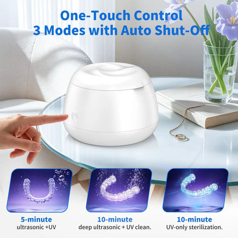 Ultrasonic Retainer Cleaner Pod with 48kHz Deep Cleaning Pro Grade, white unit on table with hand pointing.