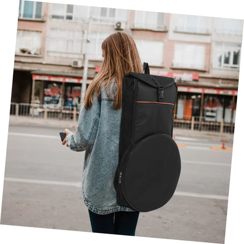 Person carrying a black Rock Solid Oxford Fabric Drum Storage Bag Hella Durable Percussion Pouch for travel.